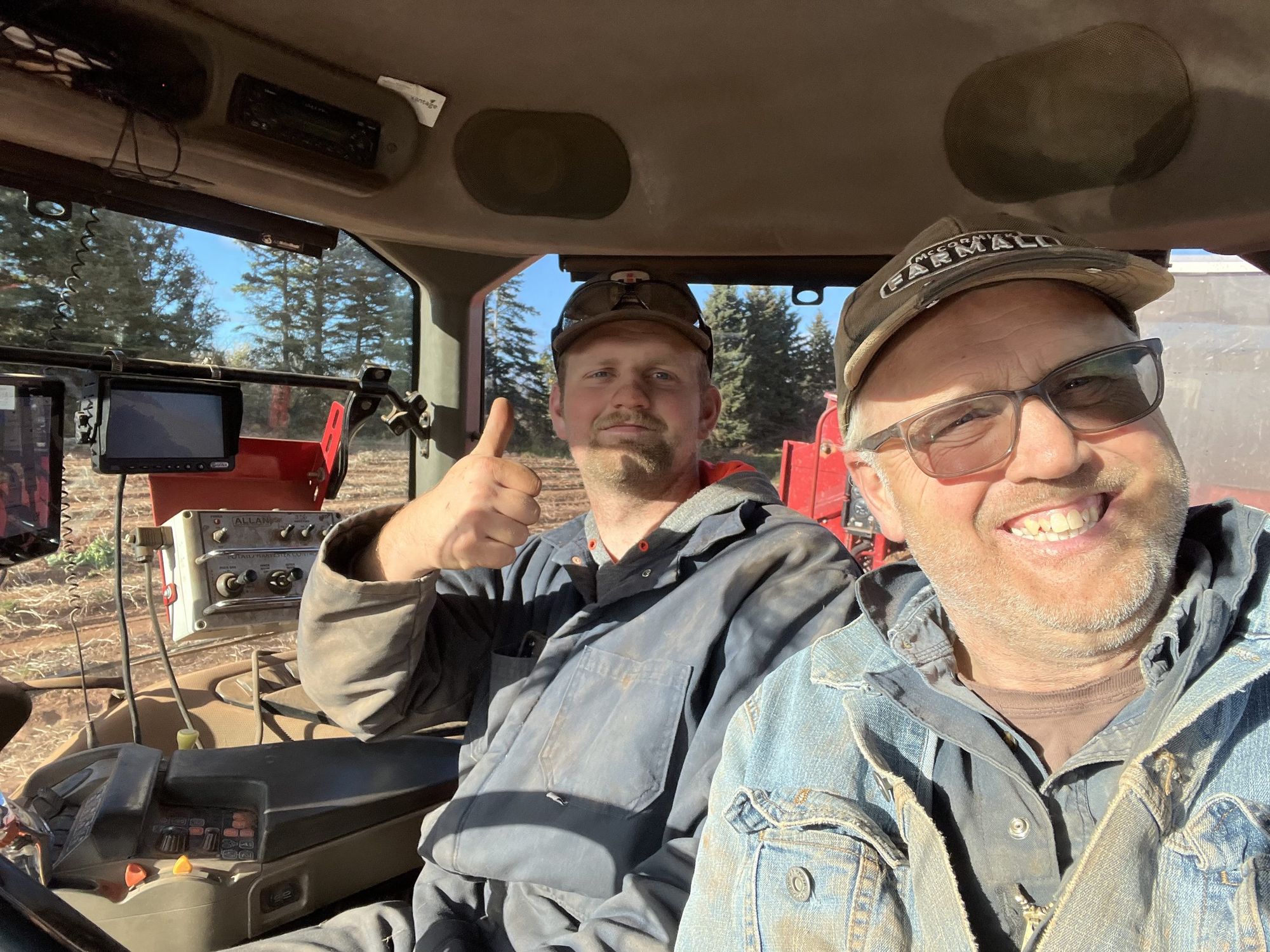 Aike and Hans Wilting together in the cab of a tractor